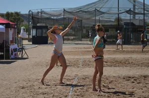 Beach volleyball blonde looking sexy and showing her body off