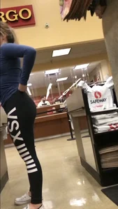 Girl in Black Yoga Pants with Hot Booty at the Store