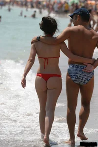 Beach voyeur girls in bikinis, thongs and topless