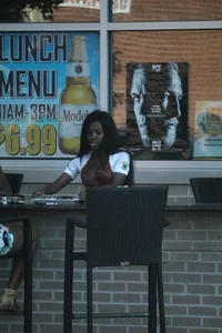 Sexy ebony Tilted Kilt employee in her uniform