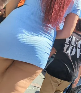 Sexy Redhead showing butt cheeks in dress (OC)