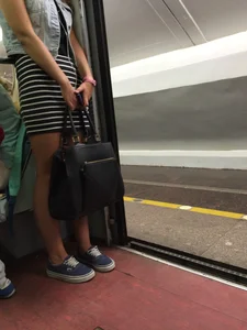 Sexy Subway Escalator Photos of a Girl in Striped Skirt