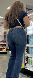 Curly hair lady in jeans @