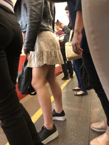 Girl in a Skirt with Sexy Legs and Booty Subway Candid Photos