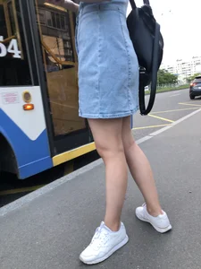 Girl in a Denim Dress and Sneakers with Nice Legs on the Bus Stop Candid Photo Gallery