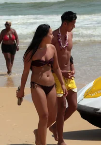 Sexy Asian on the beach with nice boobs and ass