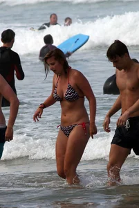 Sexy bikini babe with nice body in the water