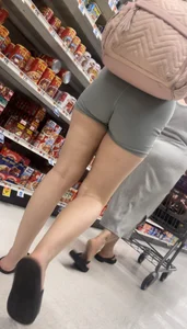 Petite girl in teal shorts
