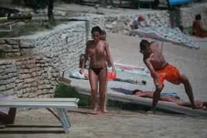 3 amazing topless girls on a nudist beach