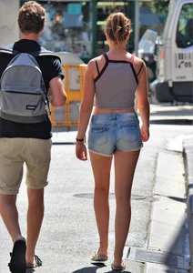 Beautiful teen out with boyfriend in short jean shorts