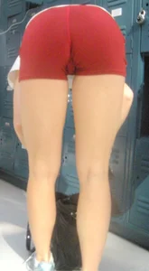 Red shorts and a tasty-looking cameltoe from the back