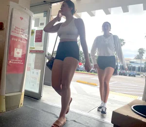 College girls at CVS with black yoga shirts and white tops