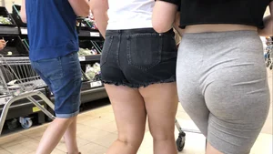 Cute brunette shopping with a nice ass in tight grey shorts with a wedgie