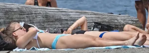 Blondie and two asian girls put on sunscreen (pt 2) [062]
