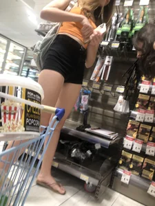 Nice teen in shorts at the supermarket sneaky pics
