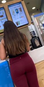 Cute chick in maroon leggings