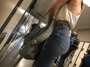 Candid Girl in Tight Jeans and a Top With a Gorgeous Butt in Lockers Corridor
