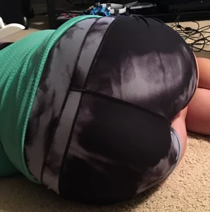Girlfriend or sister laying down in spandex shorts with a nice ass