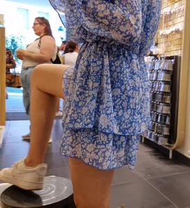 Hotter than the Sun creepshots of a candid girl in an airy dress at the store, closeup of her slim legs
