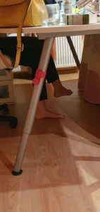 Bare Feet under Table Candid