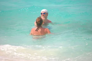 Bunch of sexy girls and milfs in bikinis at the beach