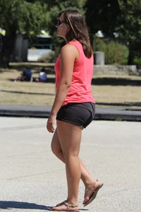 Thick girl in pink top and black shorts with vpl