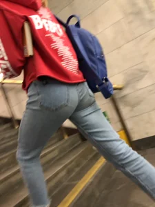 Teen in Blue Jeans Subway Candid