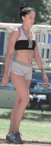Ebony babe in Hooters shorts out for a run and walk
