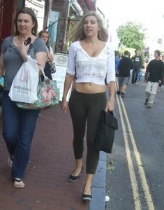 Sexy blonde out walking in green leggings with vpl