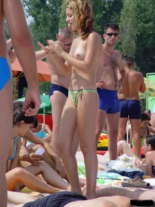 Beach voyeur girls in bikinis, thongs and topless