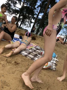 Girls in One-Piece Body Swimsuits Running Towards Water and Swimming - Beach Photo Gallery