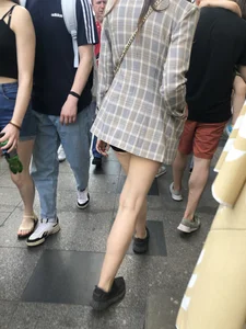 Closeups of a gorgeous girl wearing spandex mini shorts crossing the street