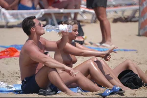 Girls on a nude beach in Bibione, Italy