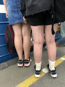 Teen Girl in a Mask and Cute Socks Subway Photos