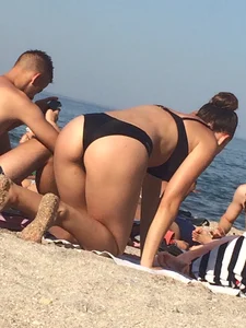 Girl in Swimsuit Standing on Knees Doggy Style Beach Candid