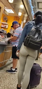 Beautiful brunette shopping in tight grey spandex with a great ass