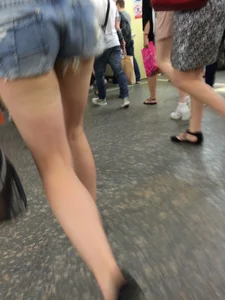 Girl with Hot Muscular Legs in Shorts - Subway Creephot