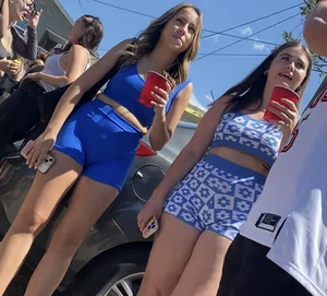 College party part 4. Cheeked up college gals wearing short shorts (plus face)