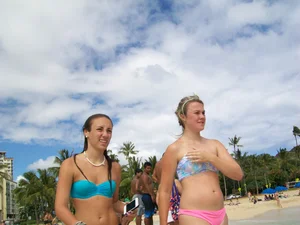 Sexy friends on vacation in pink and black bikinis with decent asses