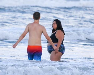 Extra thick girl at the beach in a bikini