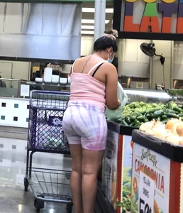 Thick Latina babe with a nice ass in tight patterned shorts