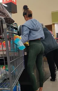Insanely hot brunette shopping in tight green leggings