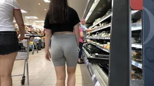 Cute brunette shopping with a nice ass in tight grey shorts with a wedgie