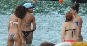 Amazing ebony ass in blue bikini with other sexy friends in bikinis