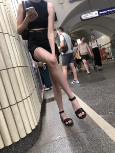 Amazing Hot Skinny Candid Girl in Shorts And Sandals Touching Her Leg on a Subway Station Creepshots Gallery