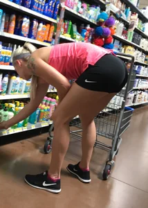Sexy blonde ass in spandex shorts shopping at Walmrt