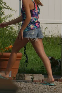 Hot teen neighbor getting ready for the beach in short shorts showing some cheek