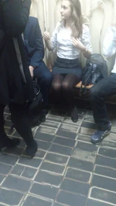 Cute Girl in a Blouse, Skirt And Black Pantyhose College Photo