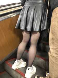 Redhead Girl in a Leather Dress And Black Pantyhose - Sexy Legs Closeup on the Subway Escalator Creepshots Gallery