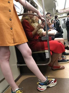 Cute Teen Girl in a Dress With Slim Legs Standing in the Subway Train, Then Crossing the Street Photo Gallery